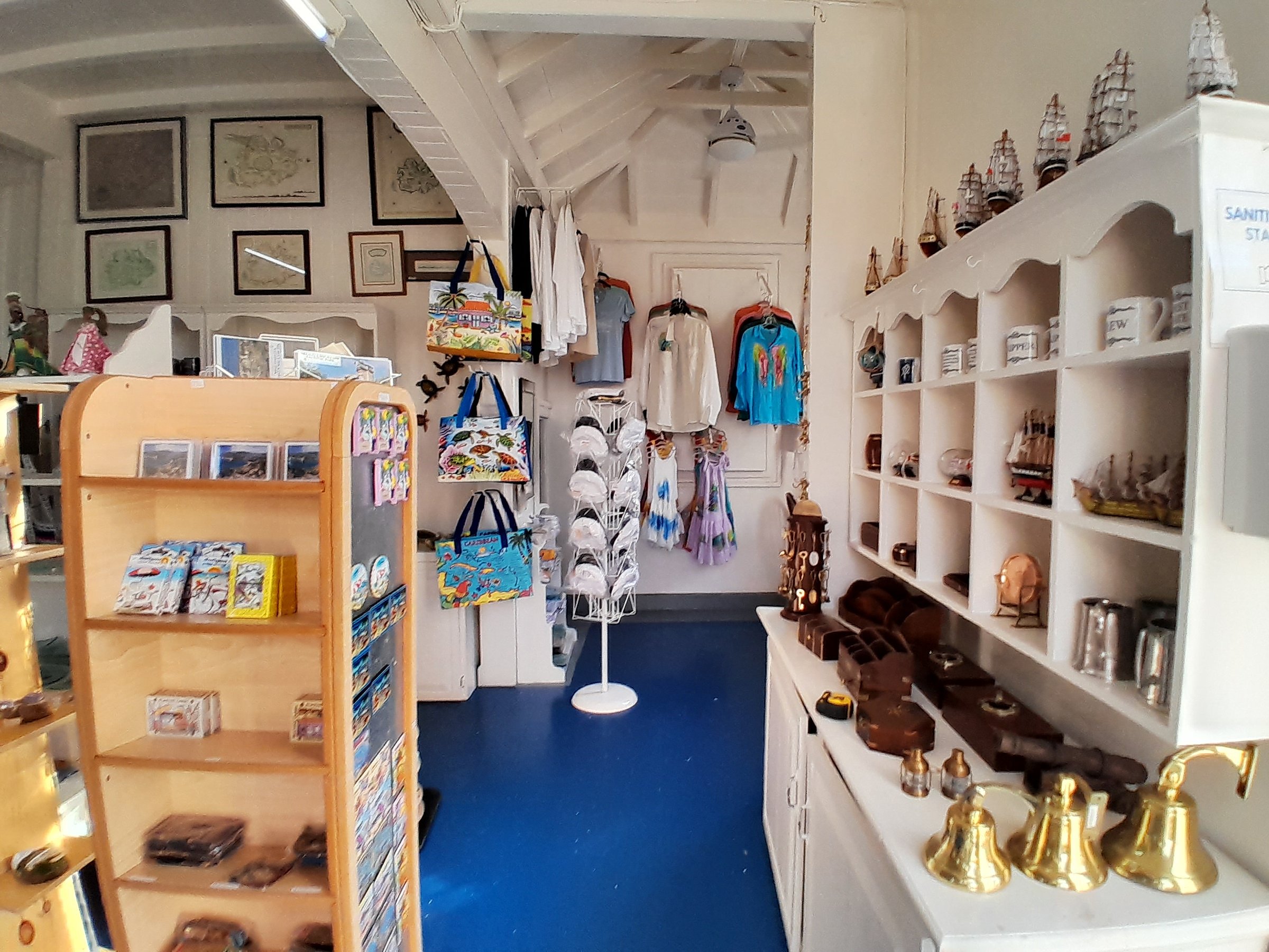 Nelson's Dockyard Gift Shop — existing interior prior to renovation, showing narrow aisles and mixed merchandise displays