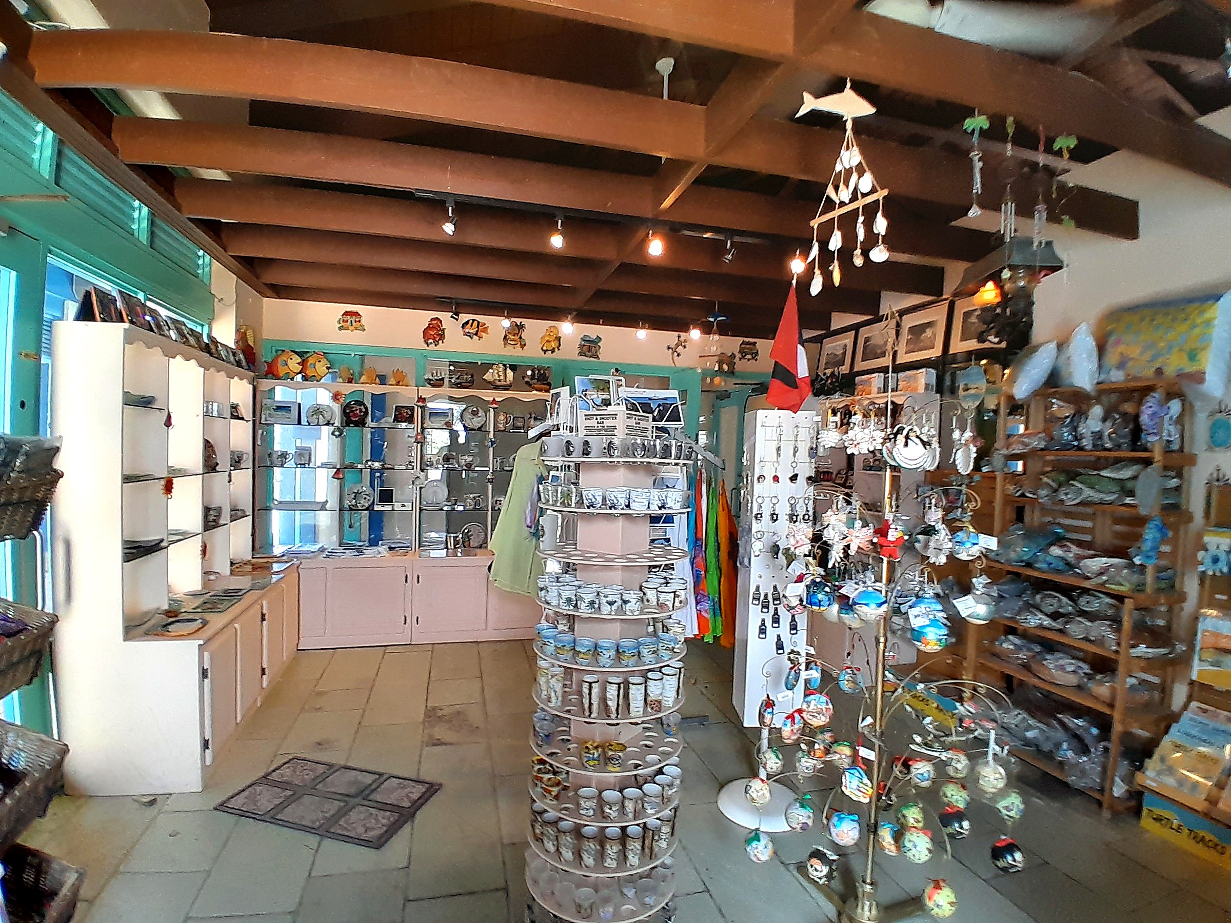 Interpretation Centre Gift Shop at Dow's Hill — existing interior prior to restoration, showing dense retail fixtures and mixed display shelving