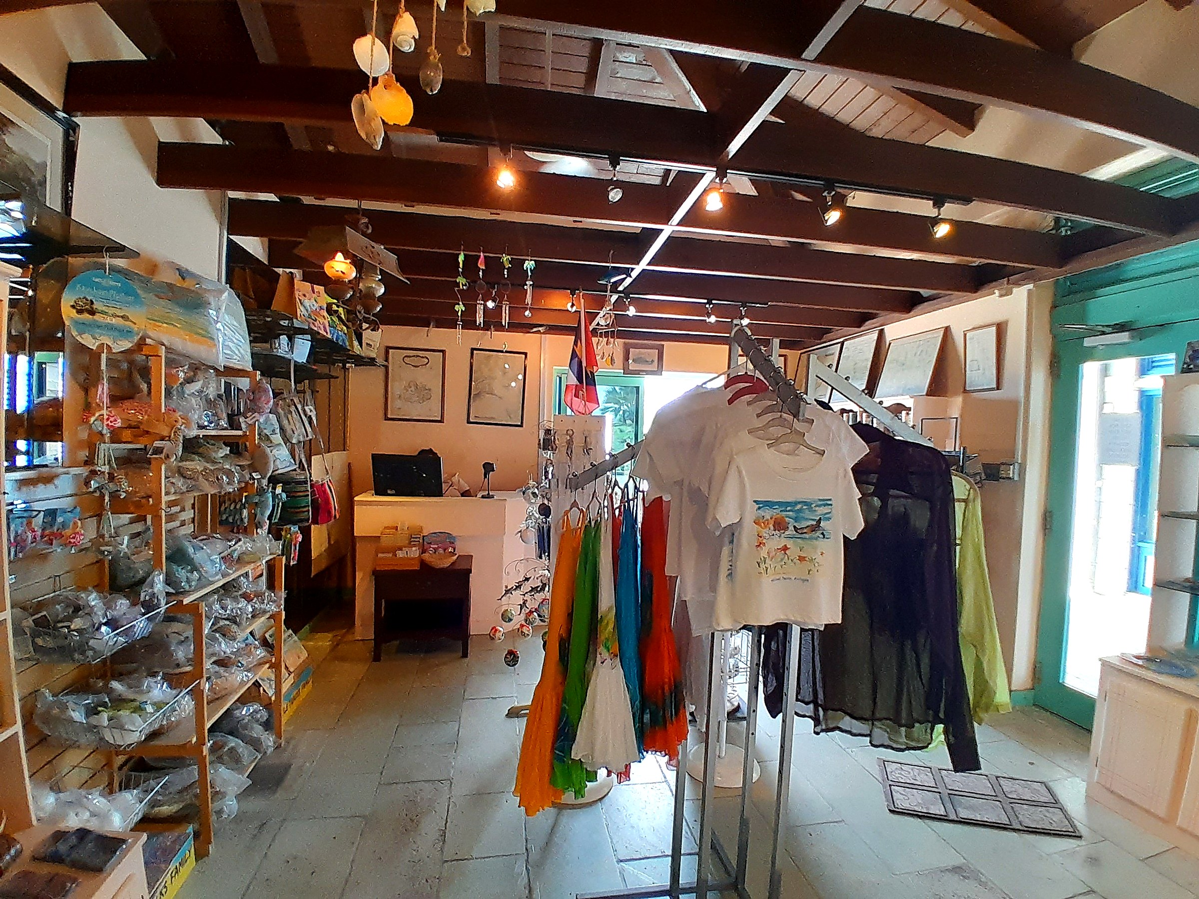 Interpretation Centre Gift Shop at Dow's Hill — existing interior prior to restoration, showing sales counter and clothing racks